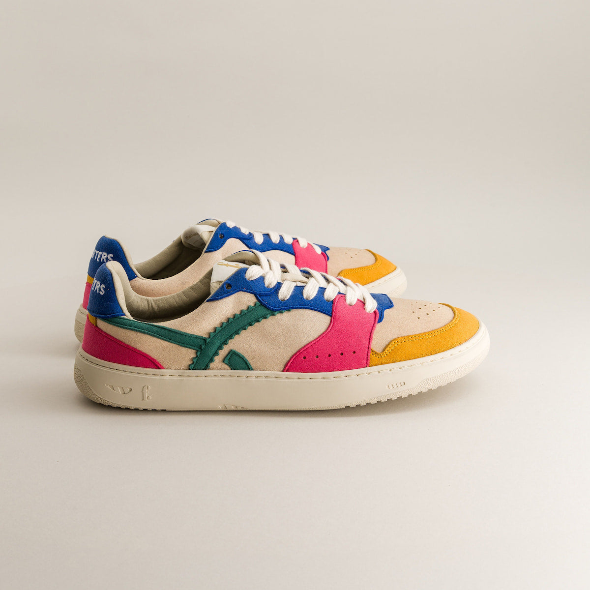 Colorful sneakers on a light gray background