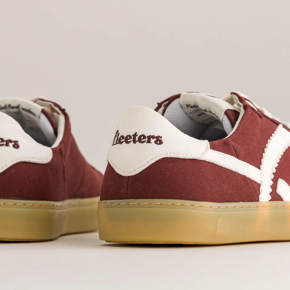 Maroon and white sneakers with 'Fleeters' branding on a light background