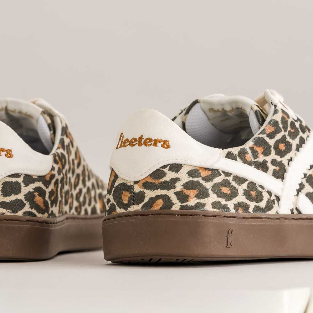Leopard print barefoot sneakers with 'Fleeters' branding on a light gray background