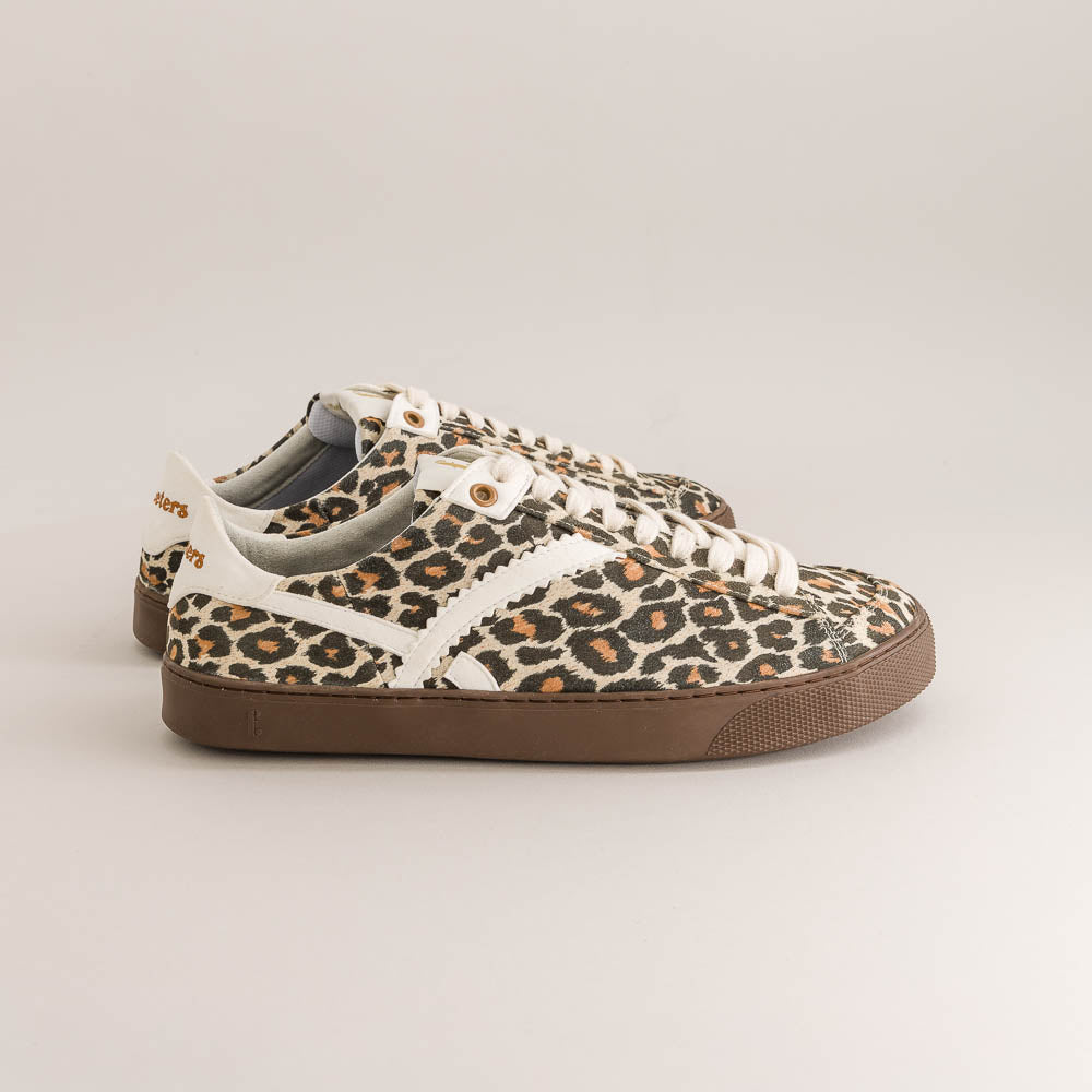 Leopard print barefoot sneakers with white laces on a light gray background