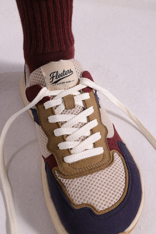 Close-up on a retro-style barefoot sneaker